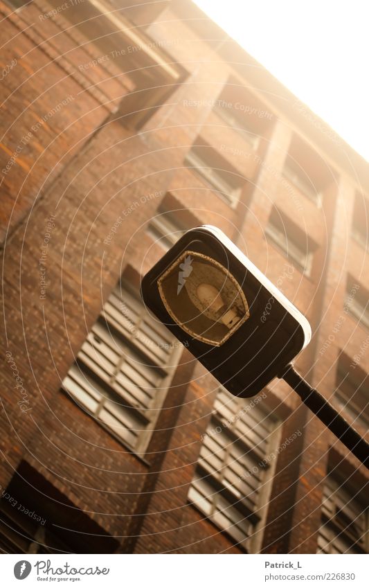 still there House (Residential Structure) Industrial plant Contentment Stagnating Lamp post Lantern Electric bulb Brick-built house Window Retro Bright Contrast