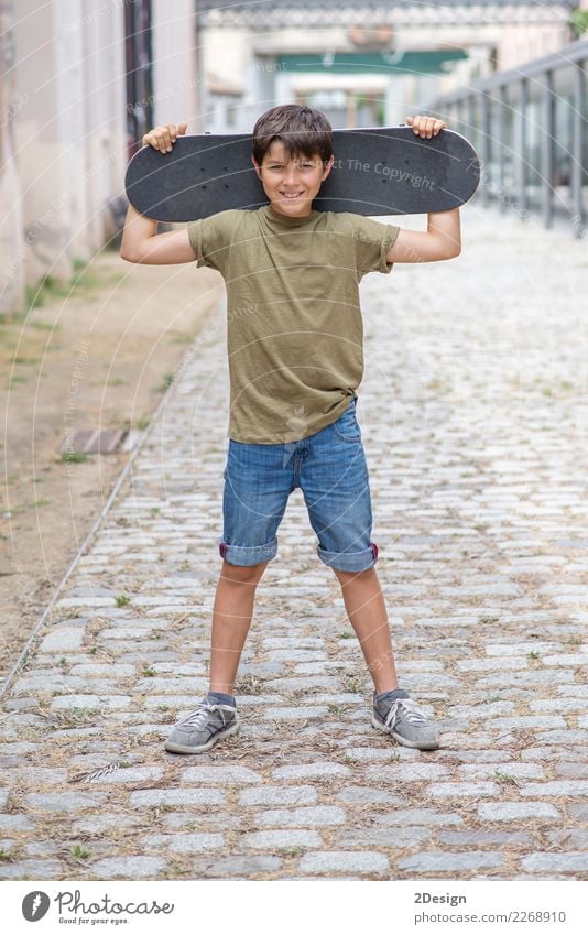 Close-up of a teenage boy carrying skateboard and smiling Lifestyle Leisure and hobbies Vacation & Travel Summer Young man Youth (Young adults) Man Adults