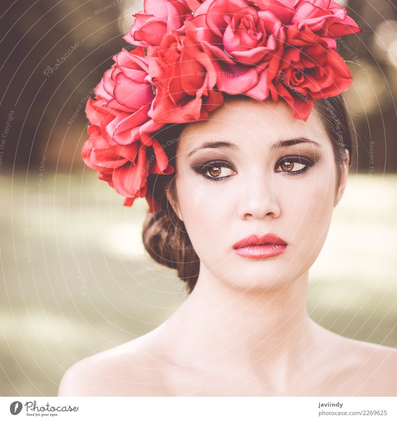 Beautiful japanese woman with pink and red flowers in hair Skin Face Make-up Garden Human being Feminine Young woman Youth (Young adults) Woman Adults 1 Nature