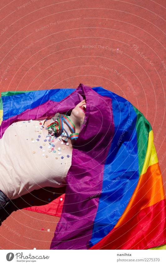 Young woman covered with a rainbow flag Lifestyle Design Joy Party Event Feasts & Celebrations Human being Feminine Homosexual Young man Youth (Young adults)