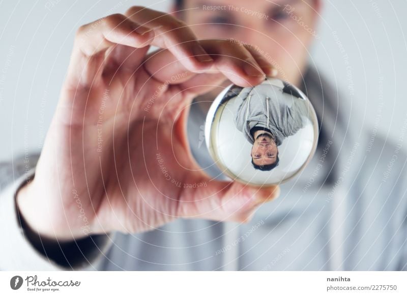 Young man viewed through a crystal ball Style Human being Masculine Youth (Young adults) Man Adults 30 - 45 years Sweater Black-haired Short-haired Facial hair