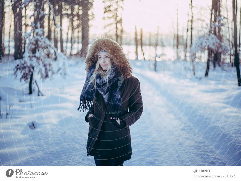 Young woman is taking a walk trough forrest at cold winter Lifestyle Joy Trip Adventure Freedom Winter Snow Winter vacation Human being Feminine