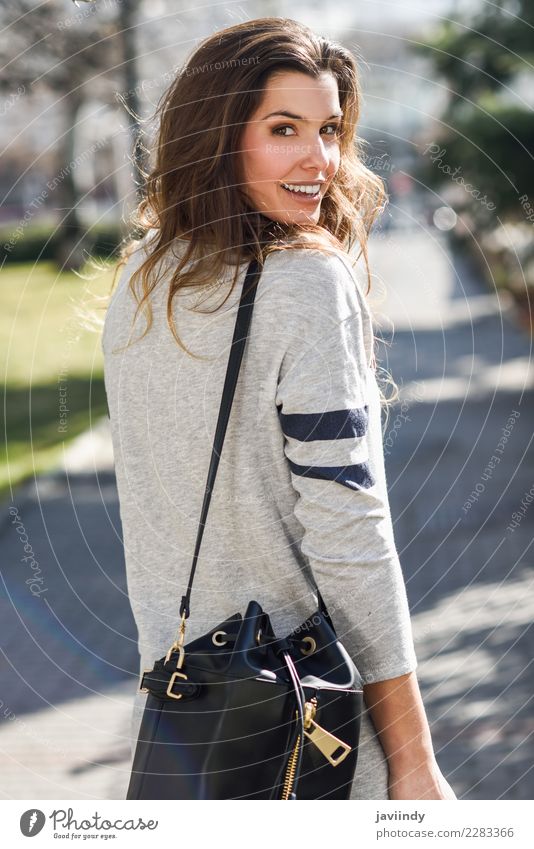 Portrait of beautiful woman smiling in the street Shopping Elegant Beautiful Human being Young woman Youth (Young adults) Woman Adults 1 18 - 30 years Street