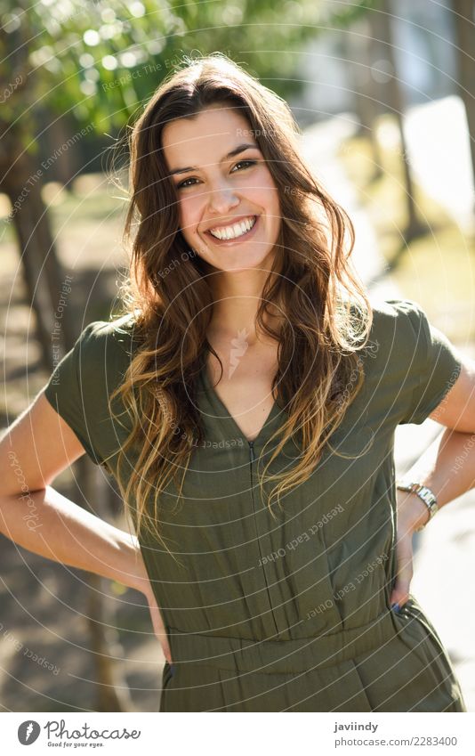 Woman smiling in a urban park Elegant Beautiful Face Summer Human being Feminine Young woman Youth (Young adults) Adults 1 18 - 30 years Nature Park Fashion