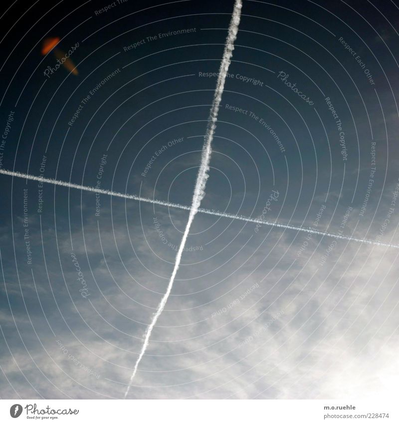 UFO Nature Air Sky Clouds Beautiful weather Road junction Aviation Vapor trail Crucifix Far-off places Sky blue Transience memento mori Colour photo