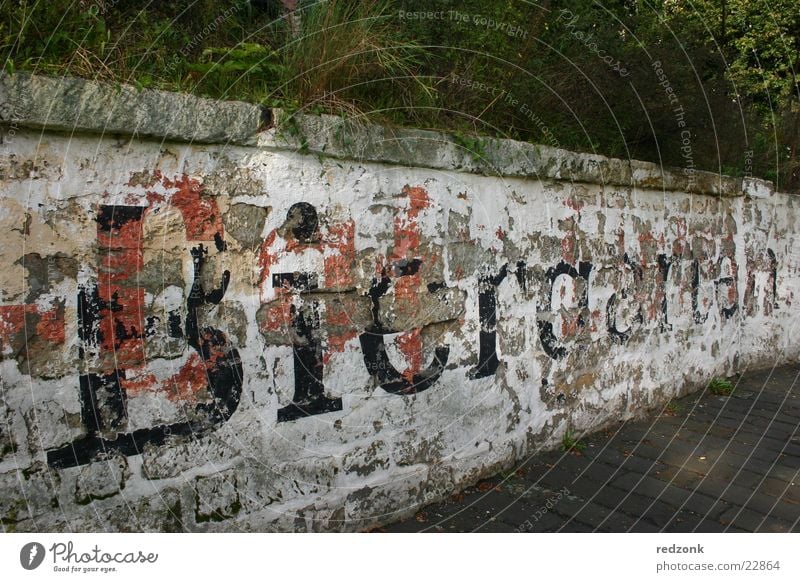 beer garden Beer garden Letters (alphabet) Wall (barrier) Black White Crumbled Closed Past Flood Leisure and hobbies Characters faded Stone End High tide