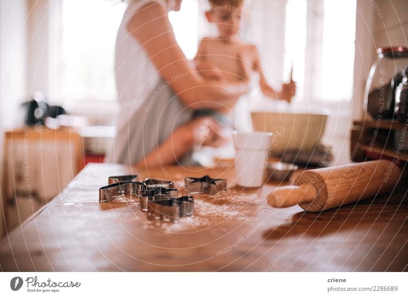 Close-up of rolling pin and cookie cutter in kitchen Winter Kitchen Parenting Child Human being Toddler Boy (child) Woman Adults Parents Mother