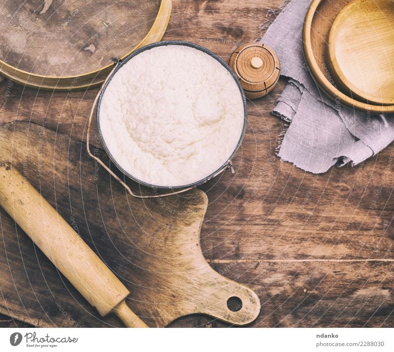 yeast dough made from wheat flour Dough Baked goods Bread Bowl Spoon Table Kitchen Wood Fresh Natural Above Brown White Yeast background Preparation food