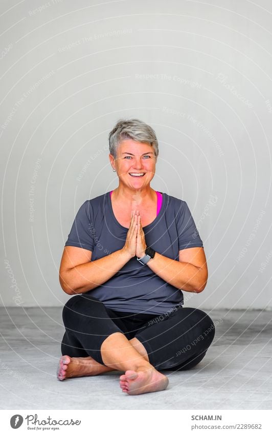 Yoga students showing different yoga poses. Sitting pose Lifestyle Relaxation Calm Meditation Human being Woman Adults 1 45 - 60 years Beautiful Uniqueness