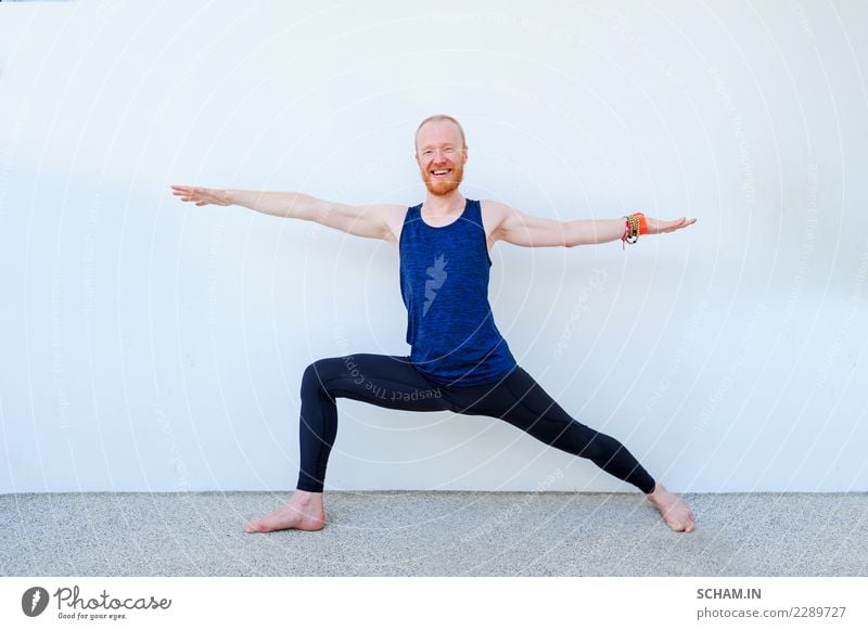 Yoga students showing different yoga poses. Warrior II and a smile into the camera Lifestyle Athletic Fitness Relaxation Human being Masculine Man Adults 1