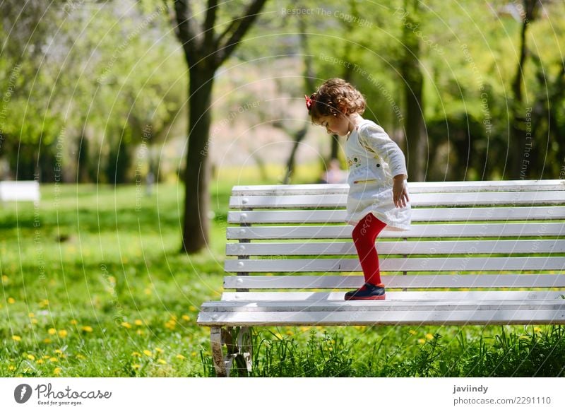 little girl playing in the park on a bench Joy Happy Beautiful Leisure and hobbies Summer Garden Child Human being Baby Girl Woman Adults Infancy 1 1 - 3 years