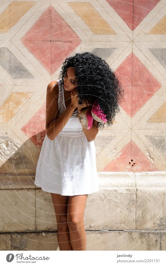 black woman, afro hairstyle, getting dressed in the street Lifestyle Beautiful Body Hair and hairstyles Face Human being Feminine Young woman