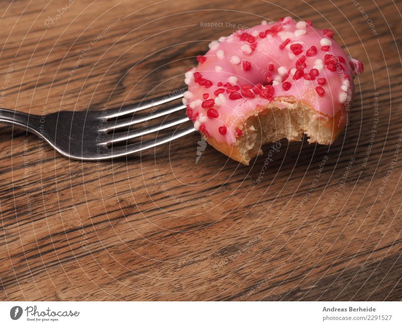 Not exactly healthy, but incredibly sweet Dough Baked goods Dessert Candy Finger food Sweet Pink Donut colorful glazed bit bakery breakfast pastry icing