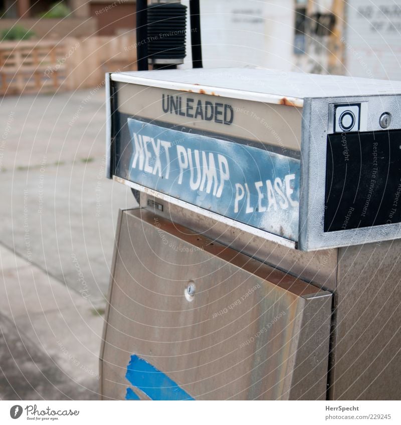 Next pump, please Petrol station Refuel unleaded Petrol pump Old Trashy Gloomy Blue Gray Decline Past Transience Closed Colour photo Exterior shot Deserted