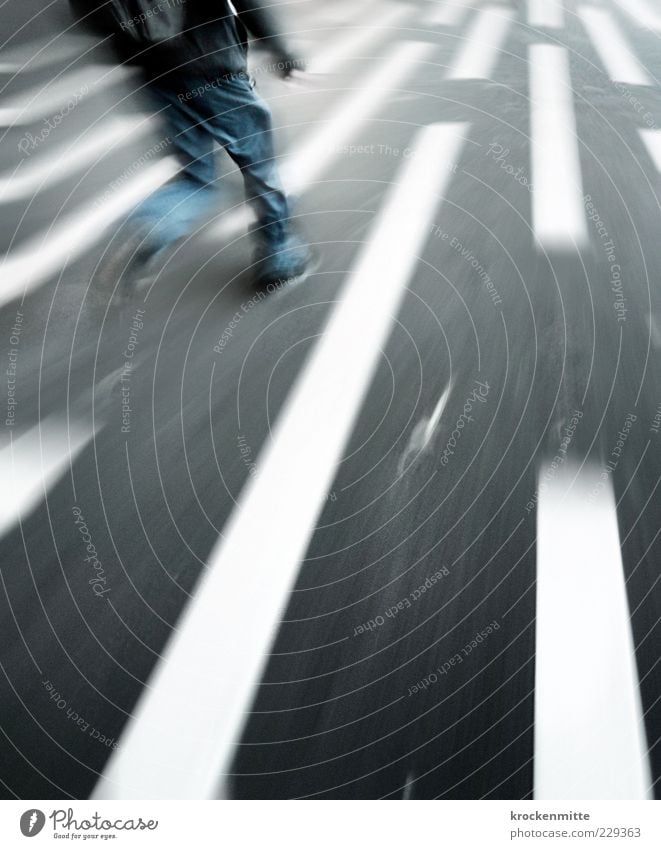 Purposefully Human being Masculine Young man Youth (Young adults) Man Adults 1 Street Sign Running Speed Blue Gray White Stress Haste Walking Backpack Jeans