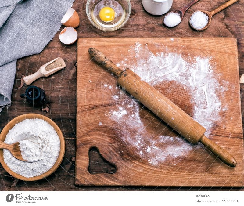 square wooden kitchen board with rolling pin Dough Baked goods Bread Bowl Spoon Table Kitchen Wood Fresh Natural Brown White Yeast background Preparation food