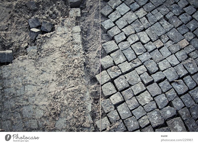 half Construction site Lanes & trails Stone Build Sharp-edged Broken Gray Chaos Arrangement Paving stone Cobblestones Ground Floor covering Road construction