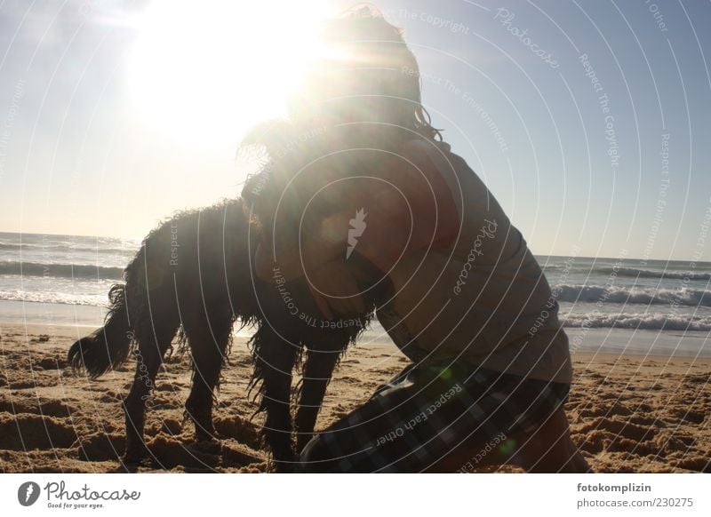 Kid hugging dog by the sea Child Dog Affection tender Friendship Embrace Touch To hold on Happy Together Emotions Trust Love of animals Protection