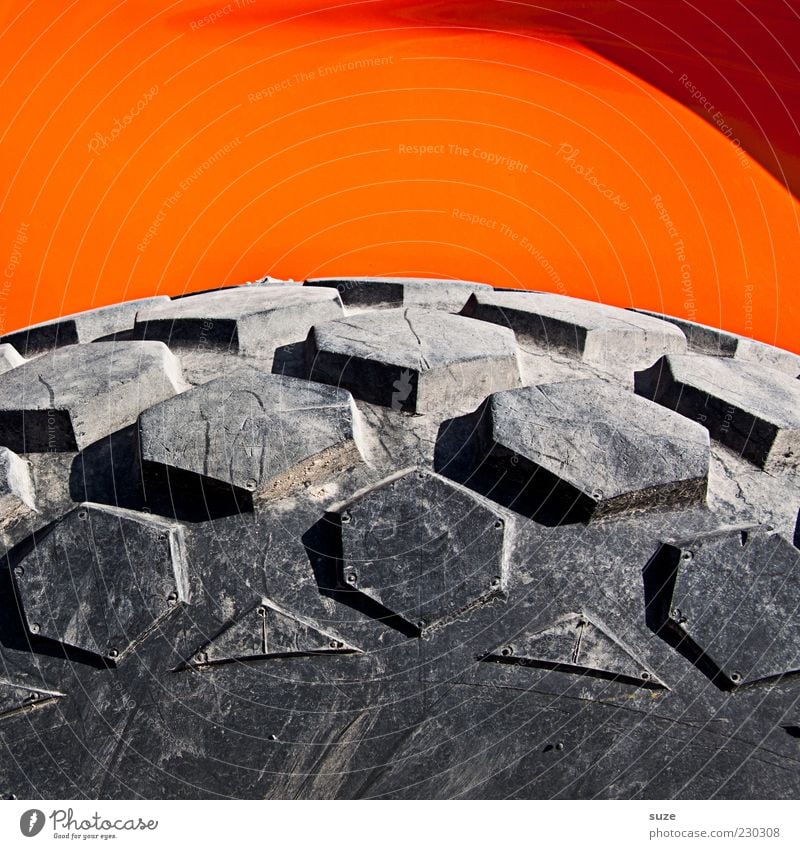 Picture with profile Construction site Simple Round Gray Orange Tire Tire tread Wheel Rubber Large Construction vehicle Colour photo Multicoloured Exterior shot