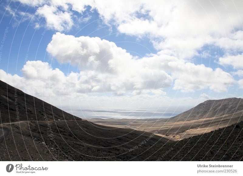 Gravel road to Cofete on Fuerteventura Vacation & Travel Tourism Trip Expedition Ocean Island Nature Landscape Air Water Sky Clouds Horizon Beautiful weather