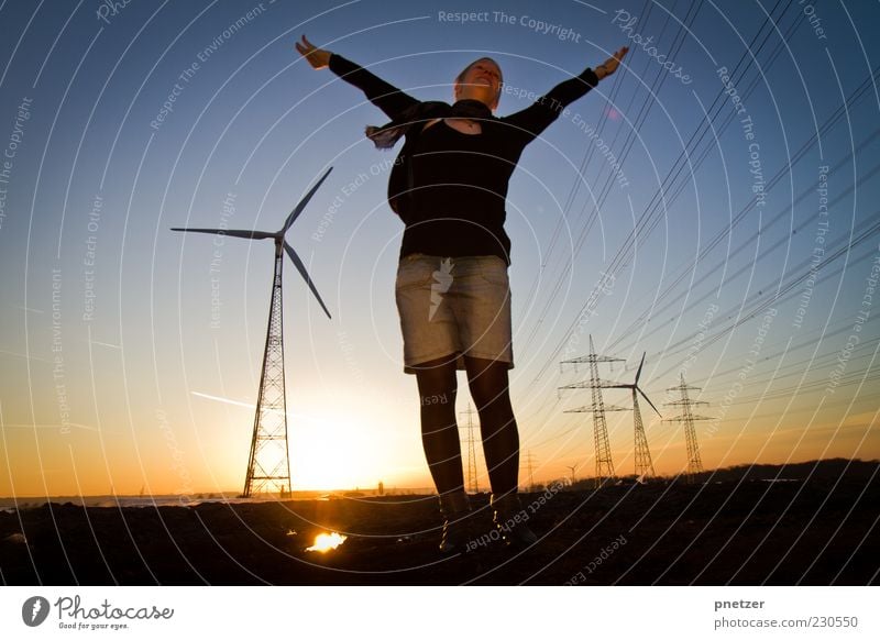 Wind energy II Energy industry Renewable energy Wind energy plant Energy crisis Human being Young woman Youth (Young adults) Woman Adults Arm 1 18 - 30 years