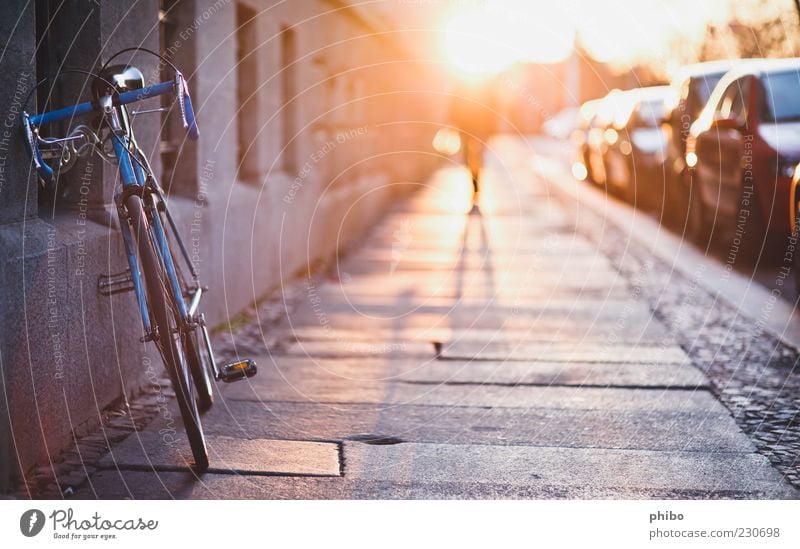 17 Summer Human being Beautiful weather Town House (Residential Structure) Wall (barrier) Wall (building) Pedestrian Sidewalk Bicycle Walking Gold Anticipation