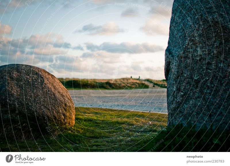 Papa Stein and his son Nature Earth Sky Meadow North Sea Blue Yellow Gold Green Dune Stone Clouds Colour photo Multicoloured Exterior shot Deserted