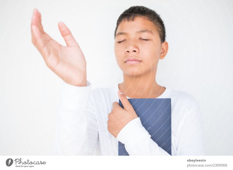 Closeup on a man holding a bible Lifestyle Reading Human being Man Adults Father Hand Fingers Book Library Church Suit Tie Paper Dark Black Hope