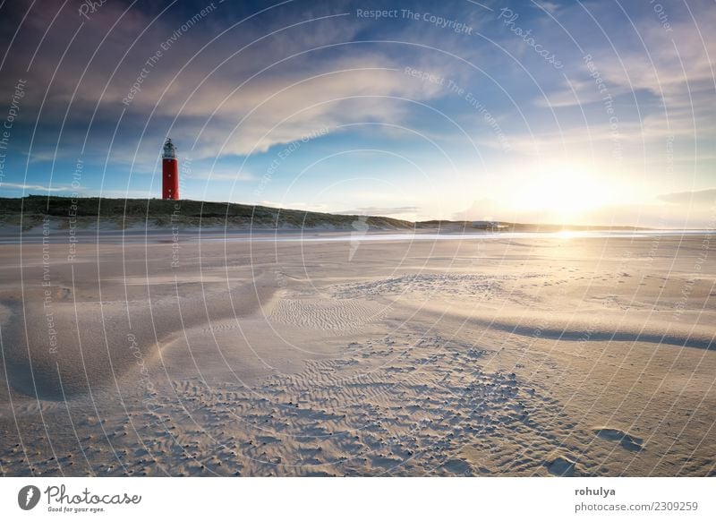 sunset behind red lighthouse on North sea coast Vacation & Travel Sun Beach Nature Landscape Sand Sky Clouds Sunrise Sunset Beautiful weather Wind Coast