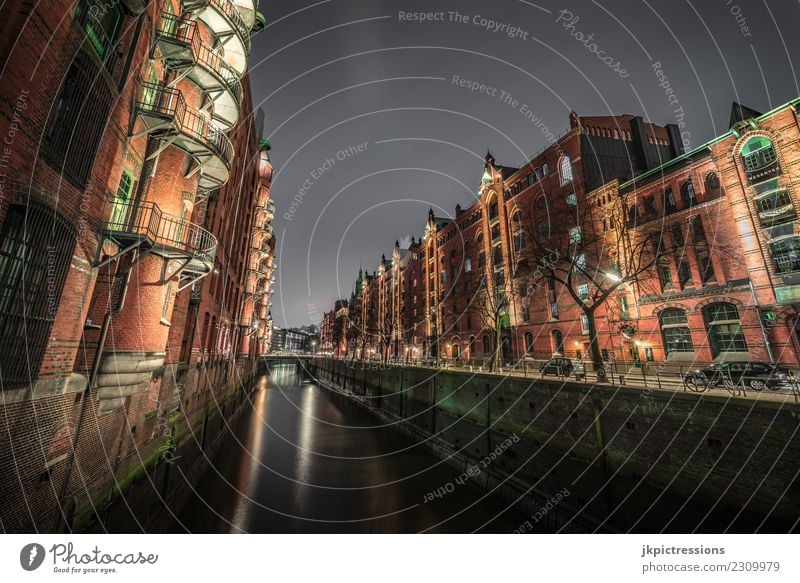 Hamburg Speicherstadt at night Europe Germany Old warehouse district World heritage Harbour Night Night shot Wide angle Clouds Dark Handrail Lighting Facade