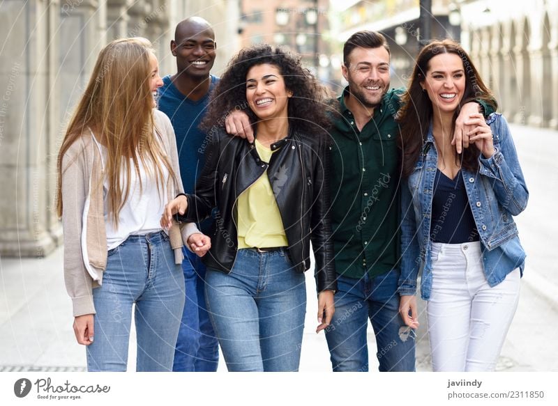 Multi-ethnic group of young people having fun together Lifestyle Joy Young woman Youth (Young adults) Young man Woman Adults Man Friendship 5 Human being Group