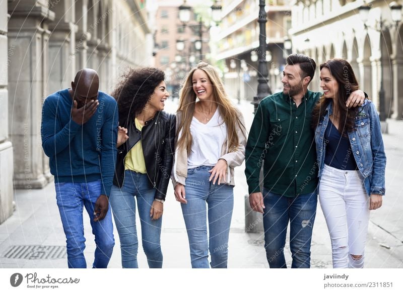 Multi-ethnic group of young people having fun together Lifestyle Joy Young woman Youth (Young adults) Young man Woman Adults Man Friendship 5 Human being Group