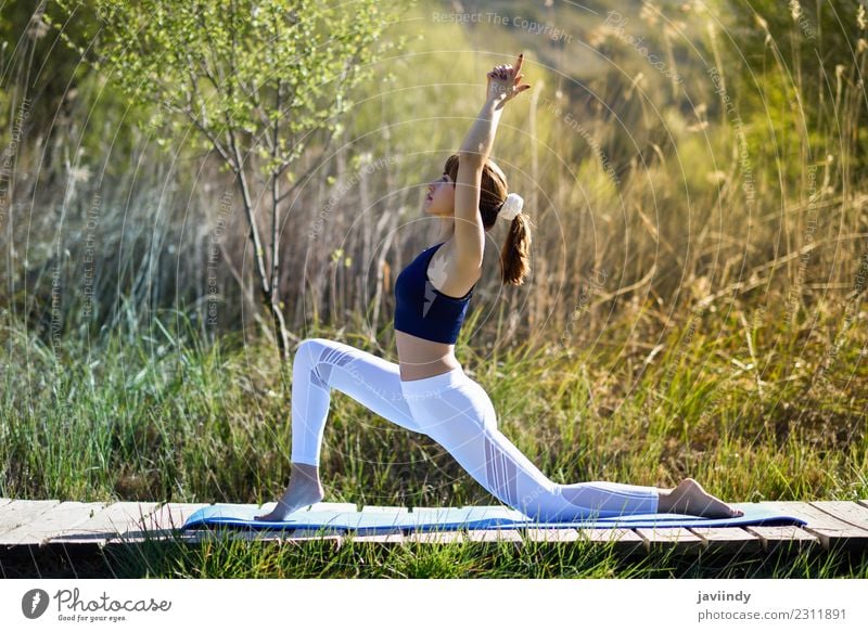 Young woman doing yoga in nature. Lifestyle Beautiful Body Relaxation Meditation Summer Sports Yoga Human being Youth (Young adults) Woman Adults 1