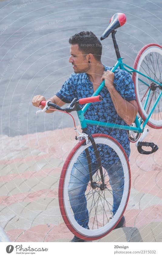 Urban man holding his bike casual wearing Lifestyle Style Happy Leisure and hobbies Human being Man Adults Friendship Sky Street Shirt Sunglasses Hat Beard