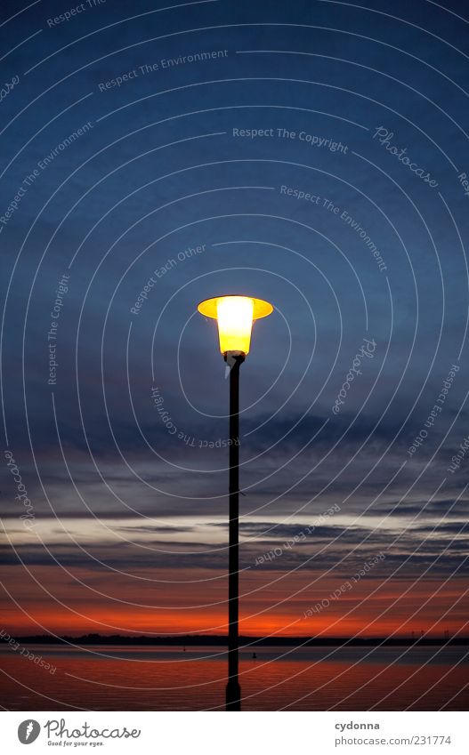 lighthouse Environment Nature Sky Clouds Horizon Lake Uniqueness Calm Moody Lantern Lamp post Dark Light Colour photo Exterior shot Detail Copy Space top