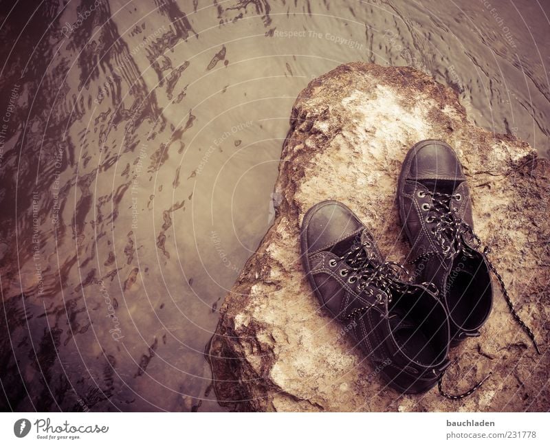 walk in my shoes! Water Footwear Stone Deserted Copy Space left Deep depth of field Bird's-eye view Pair of shoes Brown