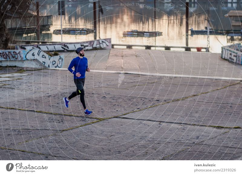 Young bearded athlete runing by the river Fitness Sports Sportsperson Jogging 1 Human being 18 - 30 years Youth (Young adults) Adults Water River Sava Belgrade