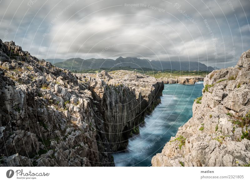 Asturian coast Nature Landscape Sky Clouds Horizon Summer Beautiful weather Wind Rock Mountain Waves Coast Bay Ocean Deserted Gigantic Blue Brown Gray Green