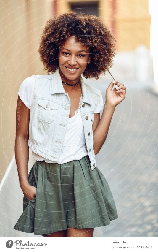 Young black woman, afro hairstyle, smiling in the street Lifestyle Style Beautiful Hair and hairstyles Face Human being Feminine Young woman