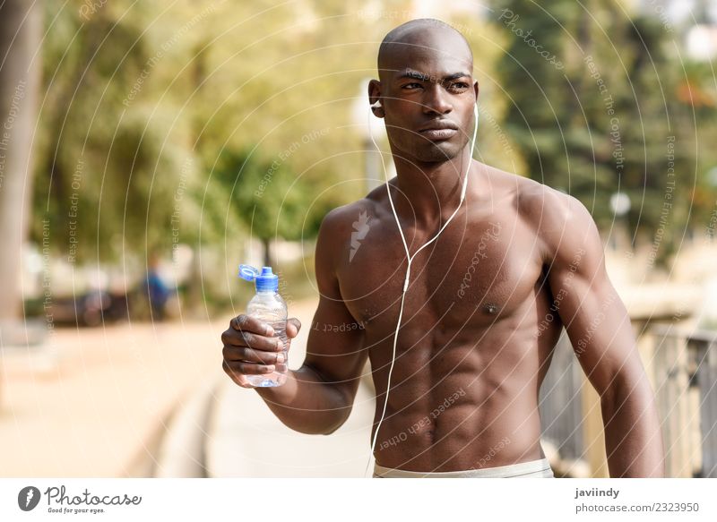 Fit shirtless young black man drinking water after running Drinking Bottle Lifestyle Body Sports Jogging Human being Masculine Young man Youth (Young adults)