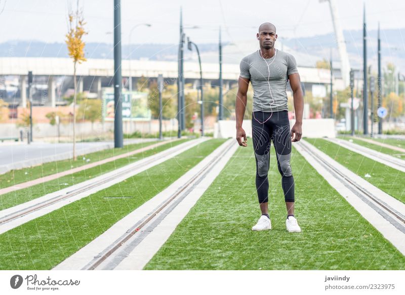 Atractive black man ready to running in urban background Lifestyle Sports Jogging Human being Young man Youth (Young adults) Man Adults Feet 1 18 - 30 years