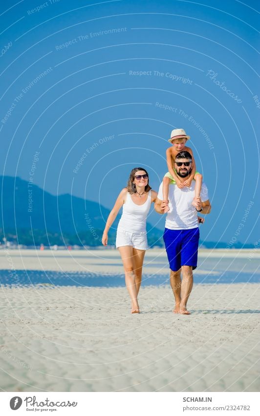 Happy young family Lifestyle Joy Playing Summer Ocean Island Infancy Group Sunglasses Beard Smiling Happiness Together 30-34 years 8-9 years Ko Samui Thailand