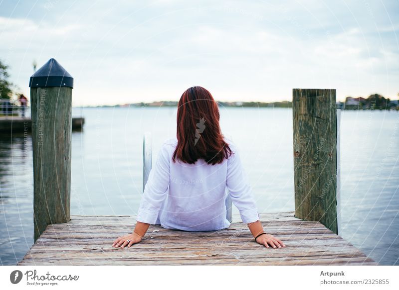 Woman sitting on a dock Lifestyle Contentment Vacation & Travel Summer vacation Beach Feminine Young woman Youth (Young adults) Back 1 Human being 18 - 30 years