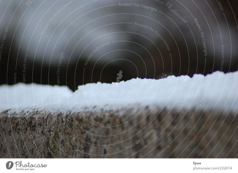 Snow-covered wall Environment Nature Elements Winter Climate Weather Stone Concrete Esthetic Authentic Dark Simple Natural Gloomy Gray White Moody Exterior shot