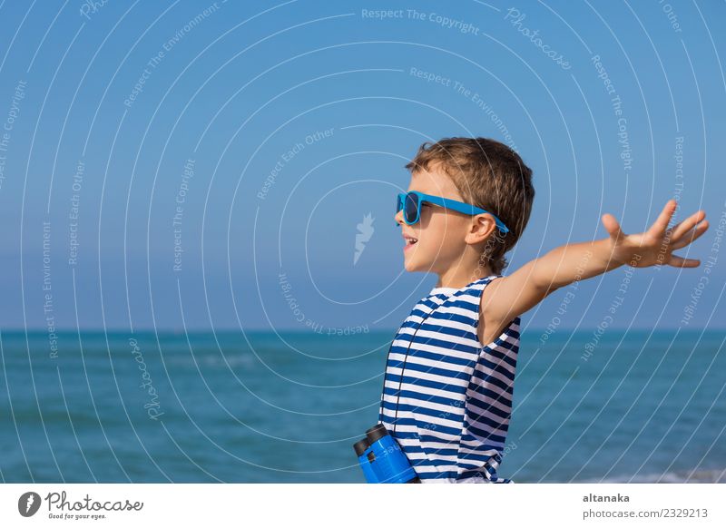 One happy little boy playing on the beach at the day time. Lifestyle Joy Happy Beautiful Relaxation Leisure and hobbies Playing Vacation & Travel Trip Adventure