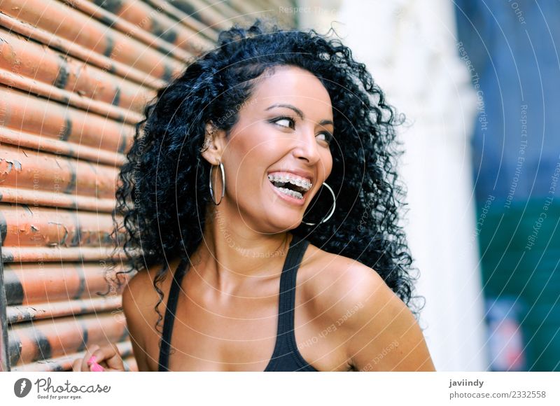 Portrait of a young black woman smiling with braces Lifestyle Beautiful Hair and hairstyles Human being Feminine Young woman Youth (Young adults) Woman Adults