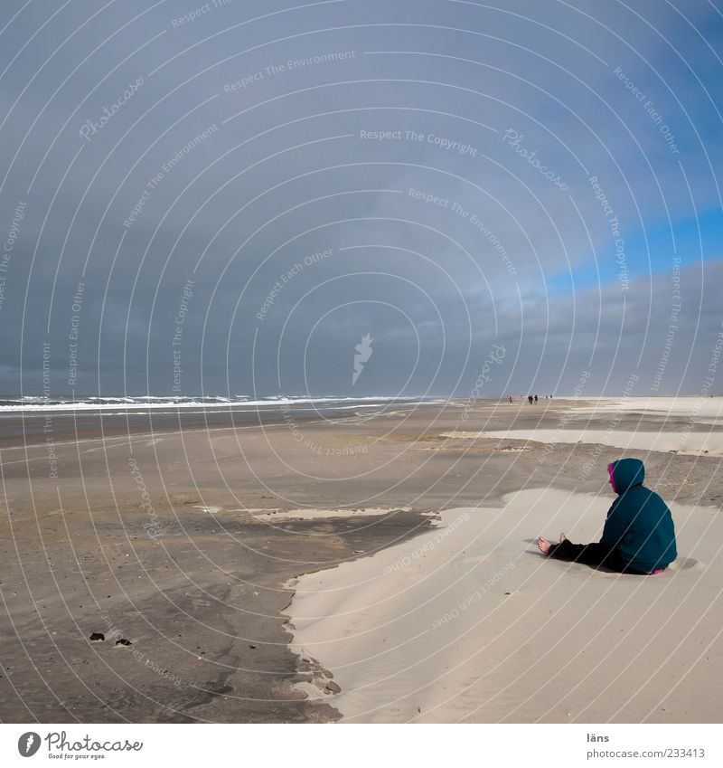 Spiekeroog, I need more sand. Human being Environment Nature Landscape Sand Clouds Sit Beach Horizon Colour photo Exterior shot Copy Space top Copy Space middle