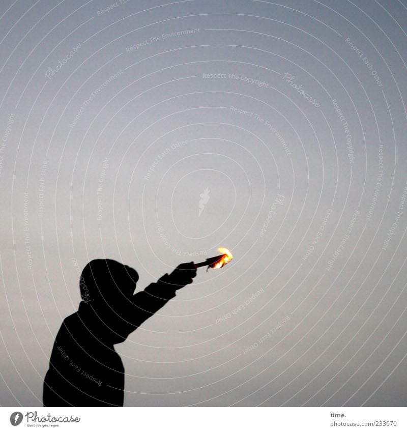 Spiekeroog | Torchlighter Masculine Man Adults Arm 1 Human being Fire Sky Dark Black Movement Resolve Moody Burn Anorak Hooded (clothing) Indicate torchbearer