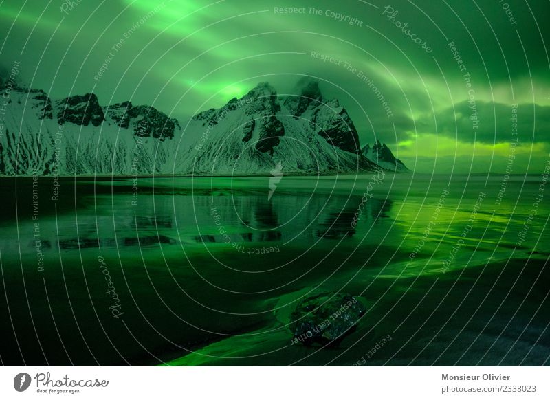 Northern lights over Vestrahorn, Iceland Environment Nature Landscape Clouds Aurora Borealis Mountain Peak Snowcapped peak Coast Green Mystic Mysterious