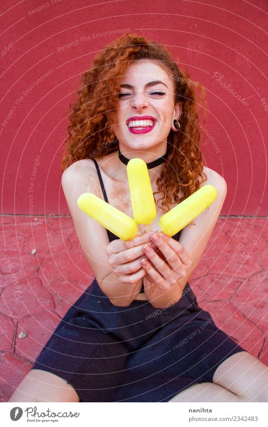 Young redhead woman holding lemon ice creams Food Ice cream Eating Lifestyle Style Joy Beautiful Hair and hairstyles Wellness Human being Feminine Young woman